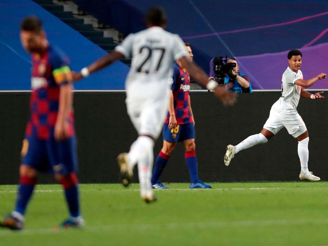 Serge Gnabry celebrates scoring Bayern's fourth: Getty