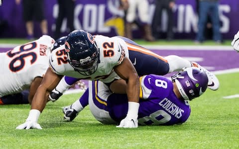 Chicago Bears linebacker Khalil Mack (52) tackles Minnesota Vikings quarterback Kirk Cousins (8) in the first quarter at U.S. Bank Stadium - Credit: USA TODAY