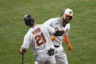 Baltimore Orioles' Renato Nunez, right, celebrates his home run with Austin Hays (21) during the second inning of a baseball game against the Miami Marlins, Thursday, Aug. 6, 2020, in Baltimore. (AP Photo/Nick Wass)