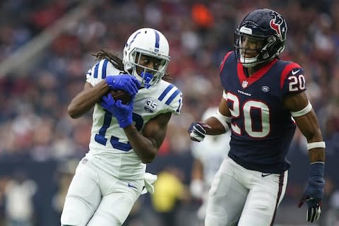 Indianapolis Colts wide receiver T.Y. Hilton (13) makes a reception as Houston Texans strong safety Justin Reid (20) defends during the second quarter at NRG Stadium - Credit: Troy Taormina/USA TODAY