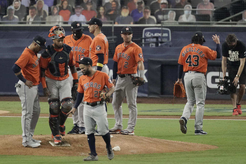 Houston Astros pitcher Lance McCullers Jr. (43) walks off the field after being relieved during the fourth inning in Game 7 of a baseball American League Championship Series against the Tampa Bay Rays, Saturday, Oct. 17, 2020, in San Diego. (AP Photo/Jae C. Hong)