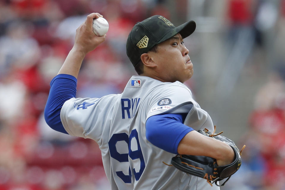 Los Angeles Dodgers starting pitcher Hyun-Jin Ryu throws in the seventh inning of a baseball game against the Cincinnati Reds, Sunday, May 19, 2019, in Cincinnati. (AP Photo/John Minchillo)