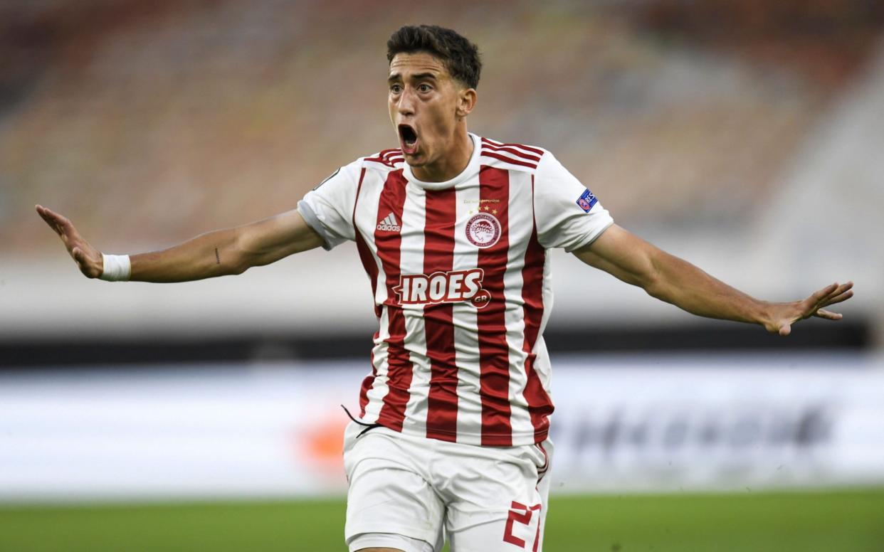  Kostas Tsimikas of Olympiacos reacts during the UEFA Europa League Round of 16 second leg match between Wolverhampton Wanderers and Olympiacos - Shutterstock