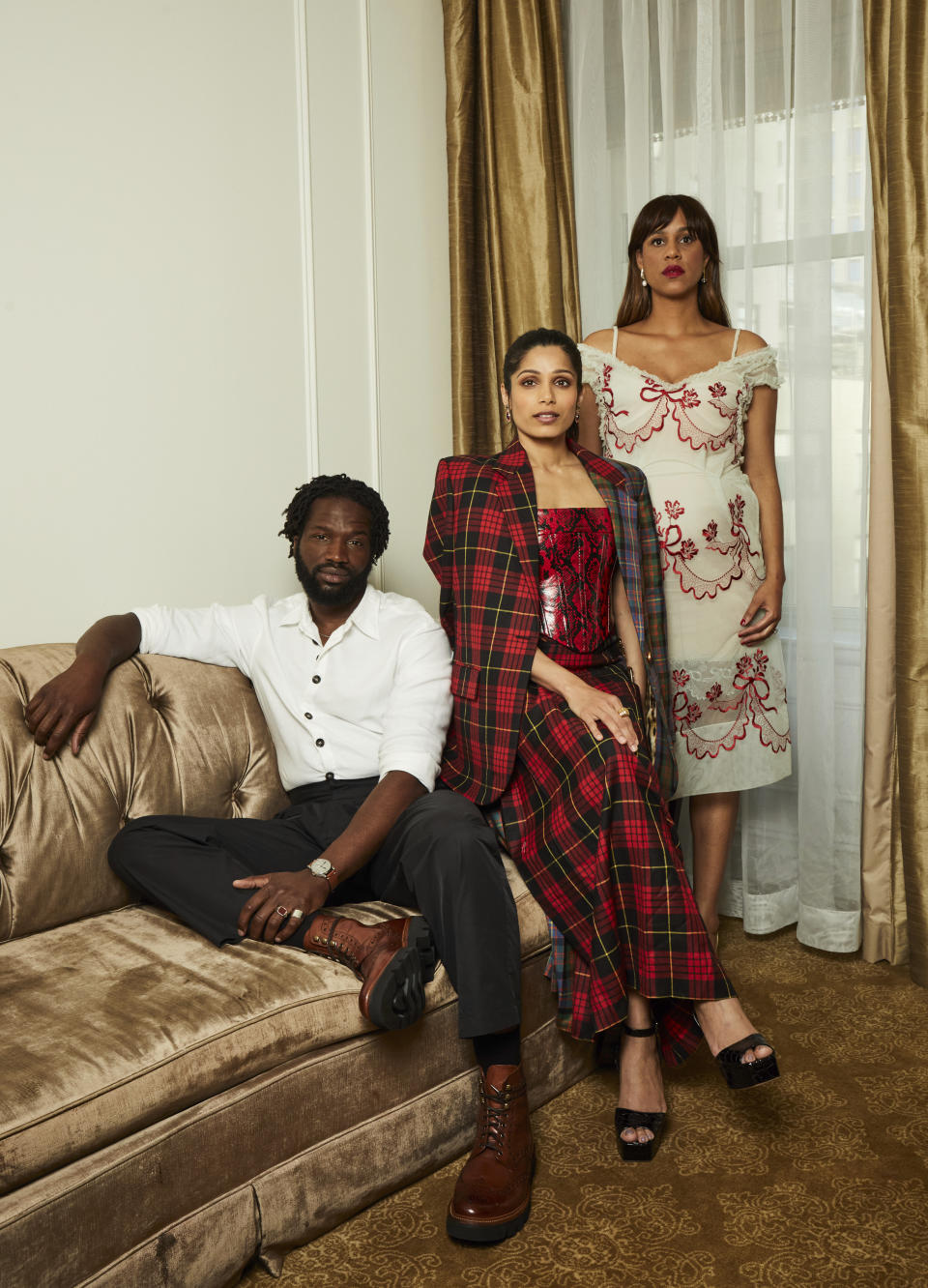 Sope Dirisu, from left, Freida Pinto and Zawe Ashton pose for a portrait to promote "Mr. Malcolm's List" on Tuesday, June 28, 2022 in New York. (Photo by Matt Licari/Invision/AP)