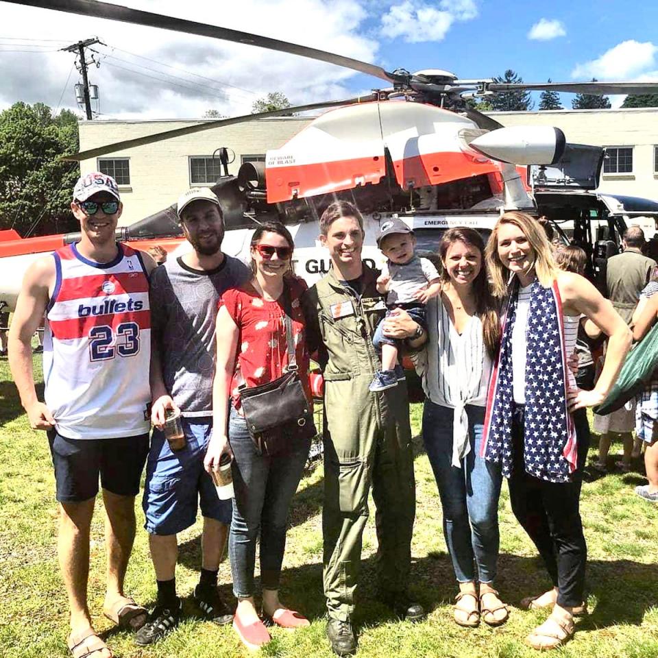 Honesdale 2005 graduate Kyle Richter (center) is all smiles after completing a flyover above the Memorial Day parade.