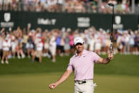 Rory McIlroy, of Northern Ireland, celebrates after winning the Wells Fargo Championship golf tournament at the Quail Hollow Club Sunday, May 12, 2024, in Charlotte, N.C. (AP Photo/Chris Carlson)