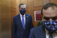 Sen. Mitt Romney, R-Utah, leaves the Senate Chamber after a procedural vote, at the Capitol in Washington, Monday, Sept. 21, 2020. Romney is one of four Republicans who could oppose a vote on a replacement for the late Justice Ruth Bader Ginsburg prior to Election Day. (AP Photo/J. Scott Applewhite)