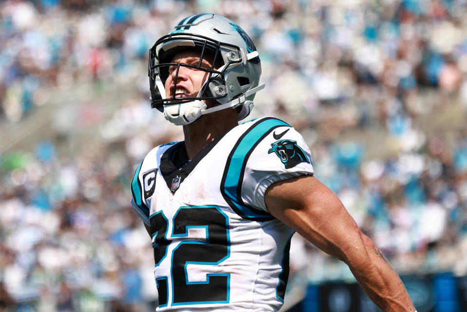 CHARLOTTE, NORTH CAROLINA - SEPTEMBER 12: Christian McCaffrey #22 of the Carolina Panthers reacts after a touchdown against the New York Jets during the second quarter at Bank of America Stadium on September 12, 2021 in Charlotte, North Carolina. (Photo by Grant Halverson/Getty Images)