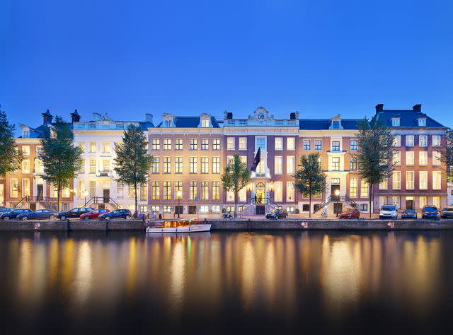 a building with a body of water in front of it