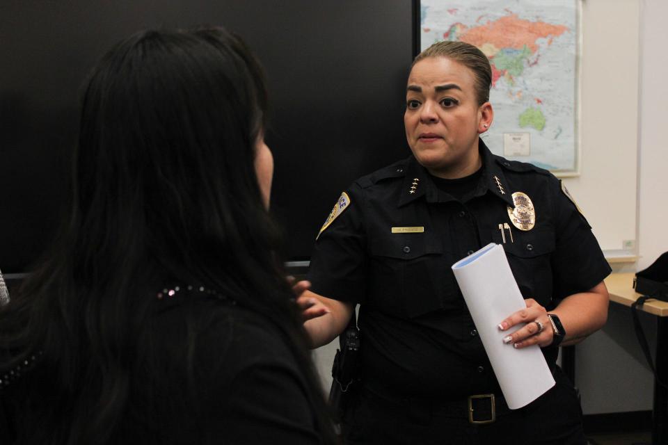 Mayra Franco, chief of police for the Stockton Unified Department of Public Safety, speaks to a parent during a safety town hall meeting at Hamilton Elementary School on Tuesday, Oct. 3, 2023.