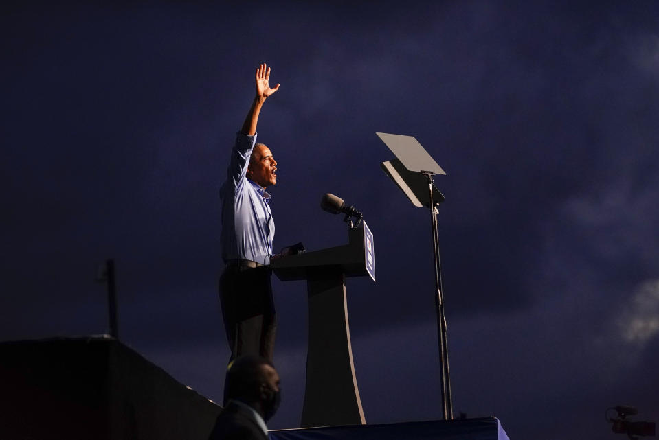 Former President Barack Obama waves after speaking at Citizens Bank Park as he campaigns for Democratic presidential candidate former Vice President Joe Biden, Wednesday, Oct. 21, 2020, in Philadelphia. (AP Photo/ Matt Slocum)