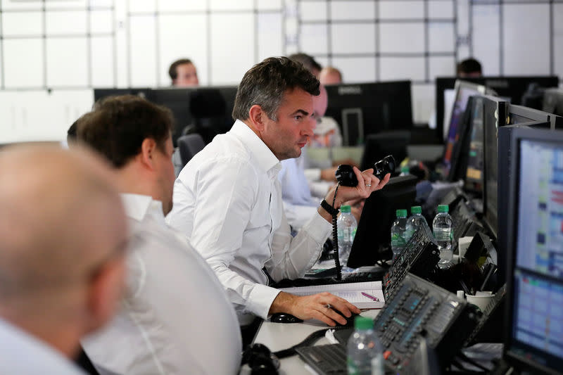 A broker looks at his computer screen on the dealing floor at ICAP in London, Britain January 3, 2018. REUTERS/Simon Dawson