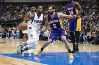 Jan 22, 2017; Dallas, TX, USA; Dallas Mavericks guard Pierre Jackson (55) moves to the basket past Los Angeles Lakers guard Jose Calderon (5) during the second quarter at the American Airlines Center. Mandatory Credit: Jerome Miron-USA TODAY Sports