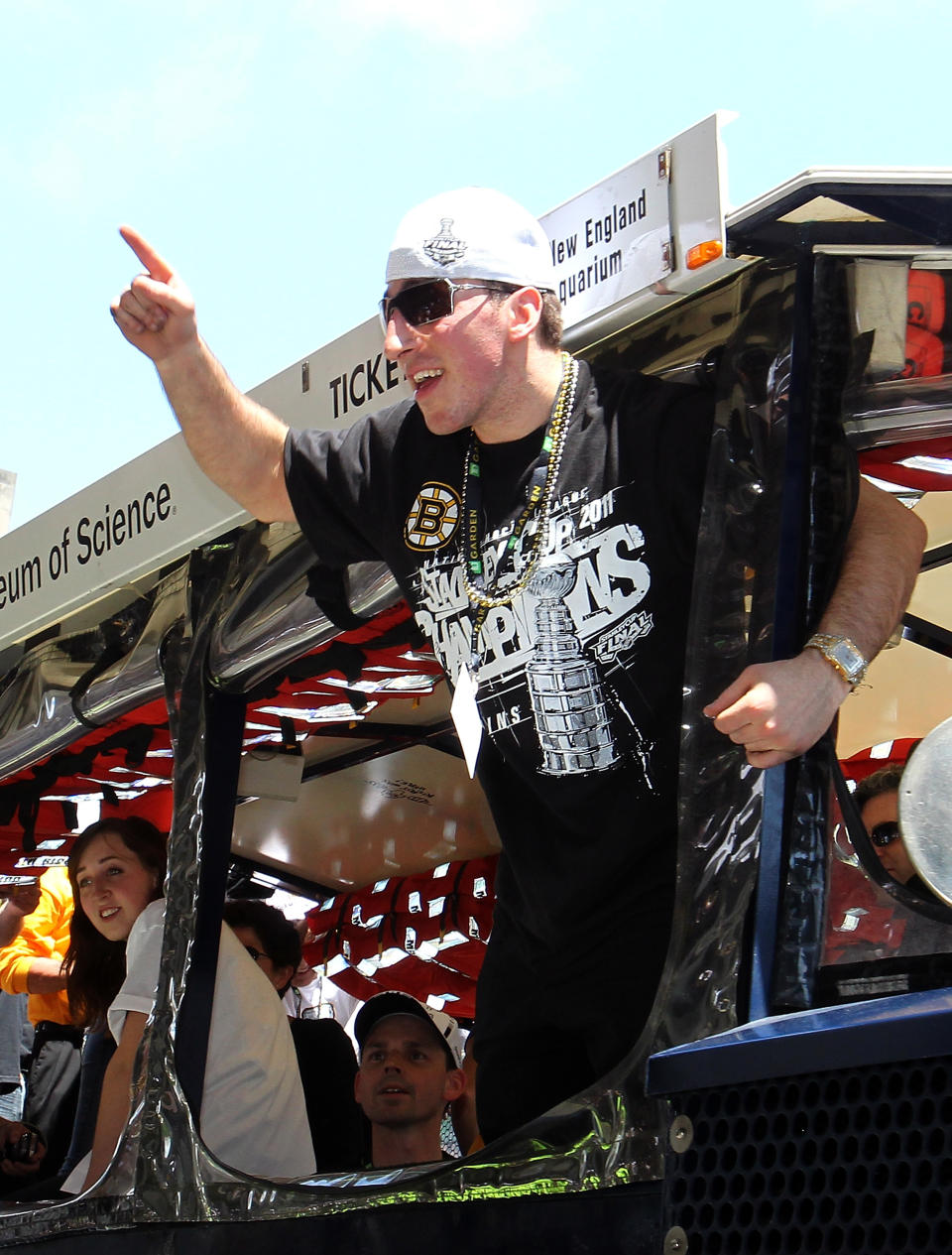 BOSTON, MA - JUNE 18: Brad Marchand of the Boston Bruins reacts to cheers during a Stanley Cup victory parade on June 18, 2011 in Boston, Massachusetts. (Photo by Jim Rogash/Getty Images)