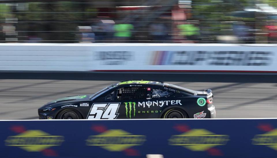 NASCAR Cup Series driver Ty Gibbs blurs past the front grandstand into Turn 1 during the NASCAR All-Star Open at North Wilkesboro Speedway in North Wilkesboro, NC on Sunday, May 19, 2024. Gibbs held off driver Bubba Wallace to win the race.
