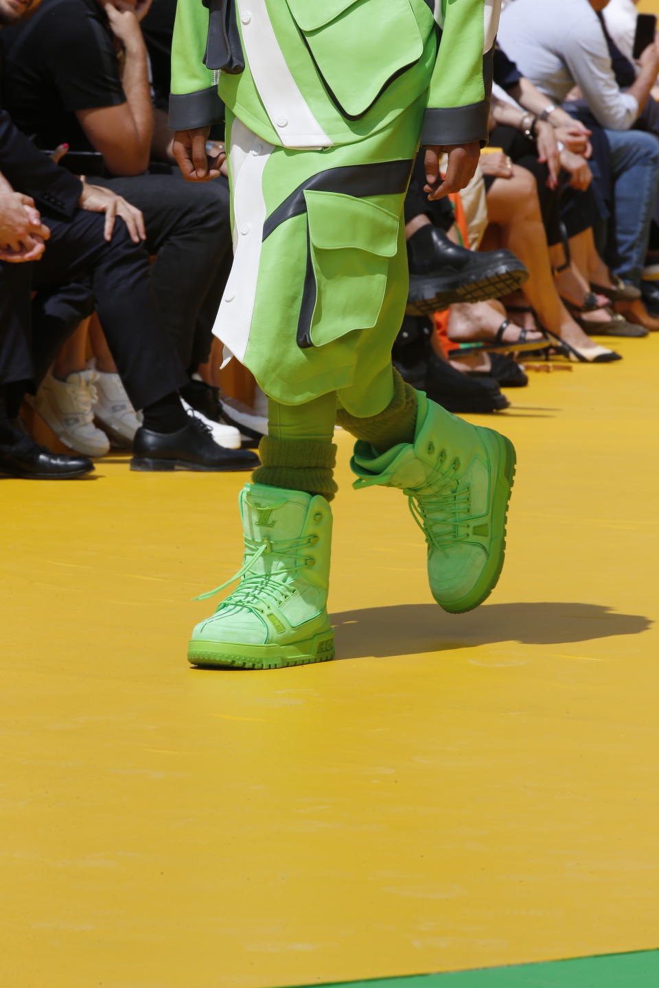 Snowboard boots in neon green at Louis Vuitton spring summer ’23, referencing Abloh’s longtime love of the sport. - Credit: JAVA-FASHION