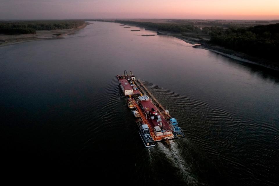 Dredge Jadwin, a U.S. Army Corps of Engineers dredging vessel, powers south down the Mississippi River, Oct. 19, 2022, past Commerce, Mo.