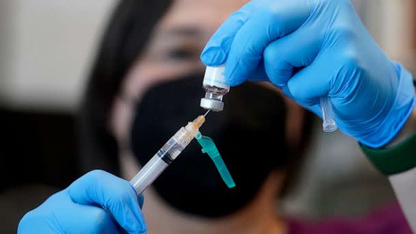 PHOTO: A registered nurse prepares a dose of a Monkeypox vaccine at the Salt Lake County Health Department, July 28, 2022, in Salt Lake City. (Rick Bowmer/AP, FILE)