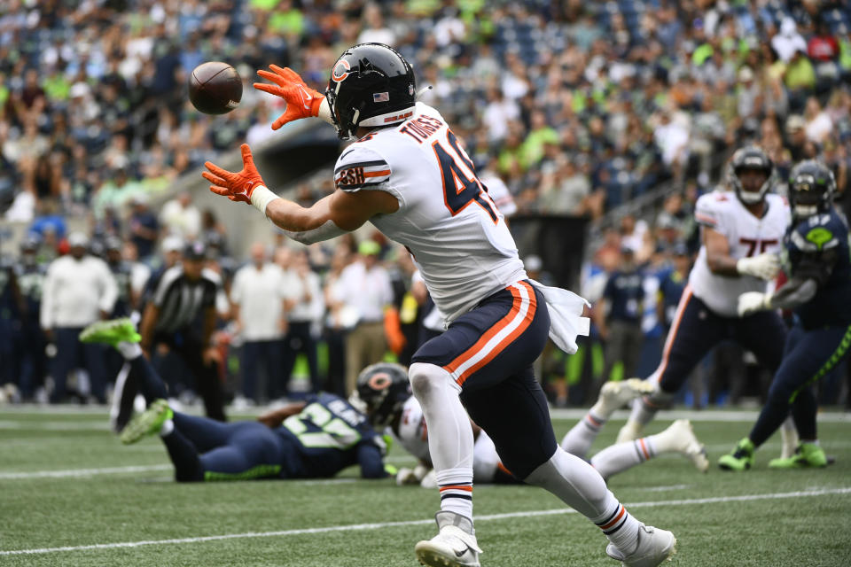 Chicago Bears tight end Jake Tonges catches a pass for a touchdown during the first half of a preseason NFL football game against the Seattle Seahawks, Thursday, Aug. 18, 2022, in Seattle. (AP Photo/Caean Couto)