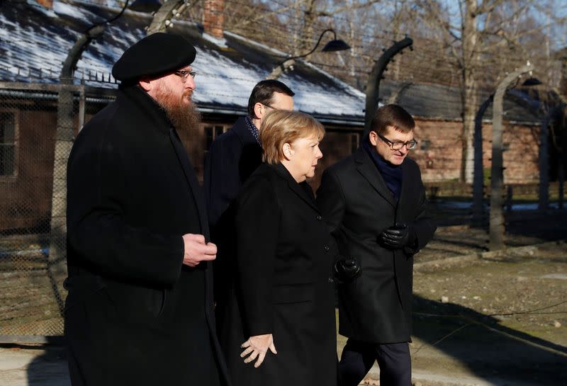 German Chancellor Angela Merkel and Polish Prime Minister Mateusz Morawiecki visit the Auschwitz-Birkenau memorial and museum