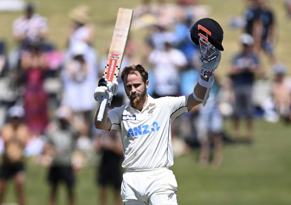 New Zealand cricket captain Kane Williamson celebrates on reaching his century during play on day two of the first cricket test between Pakistan and New Zealand at Bay Oval, Mount Maunganui, New Zealand, Sunday, Dec. 27, 2020. (Andrew Cornaga/Photosport via AP)