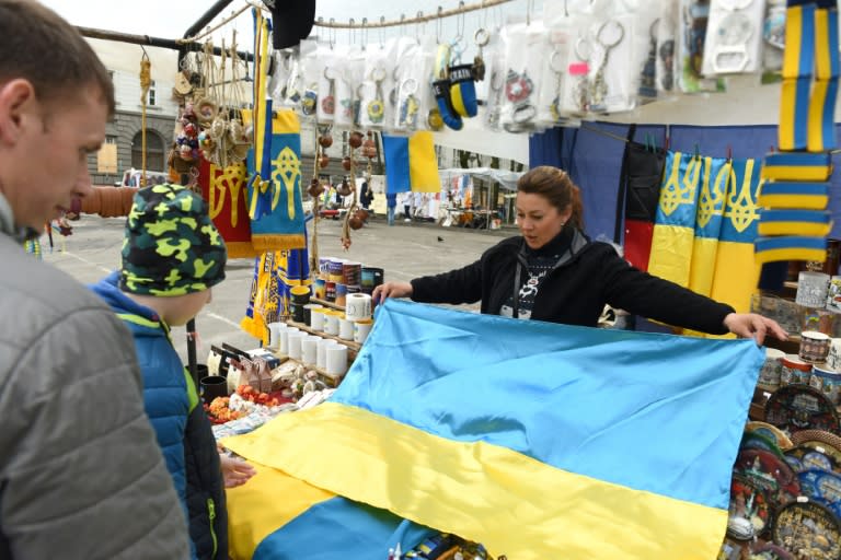 Anna's family were looking for souvenirs to take to England (AFP/Yuriy Dyachyshyn)
