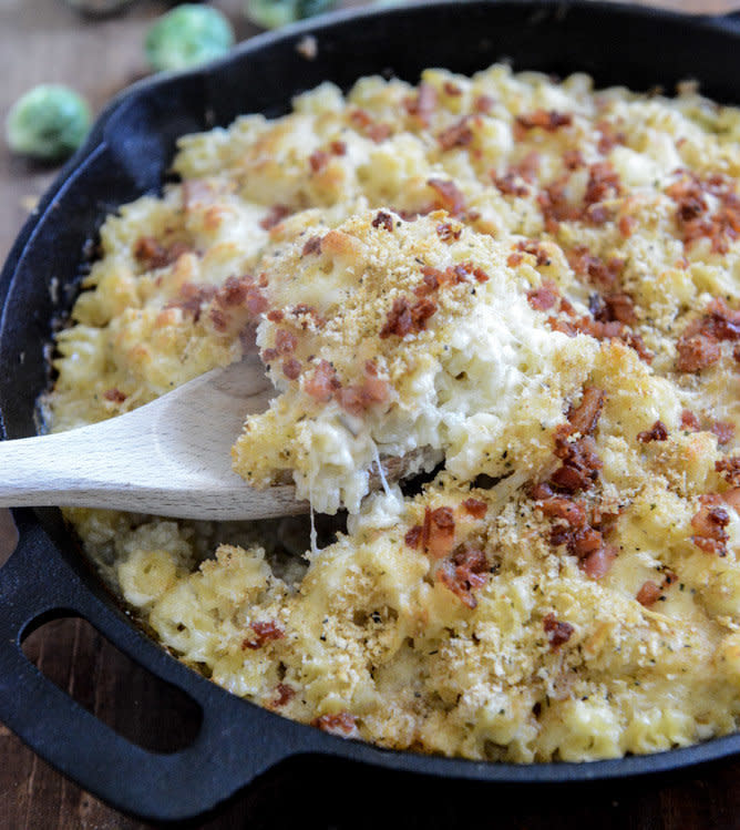 <strong>Get the <a href="http://www.howsweeteats.com/2013/11/fontina-and-white-cheddar-skillet-brussels-bacon-mac/" target="_blank">Skillet Brussels Bacon Mac and Cheese recipe</a> from How Sweet It Is</strong>