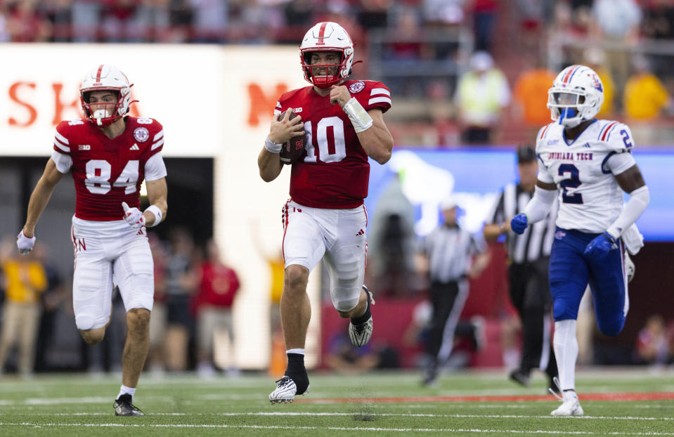 Nebraska quarterback Heinrich Haarberg (10) rushes for 72 yards to score a touchdown against Louisiana Tech during the second half of an NCAA college football game, Saturday, Sept. 23, 2023, in Lincoln, Neb. (AP Photo/Rebecca S. Gratz)