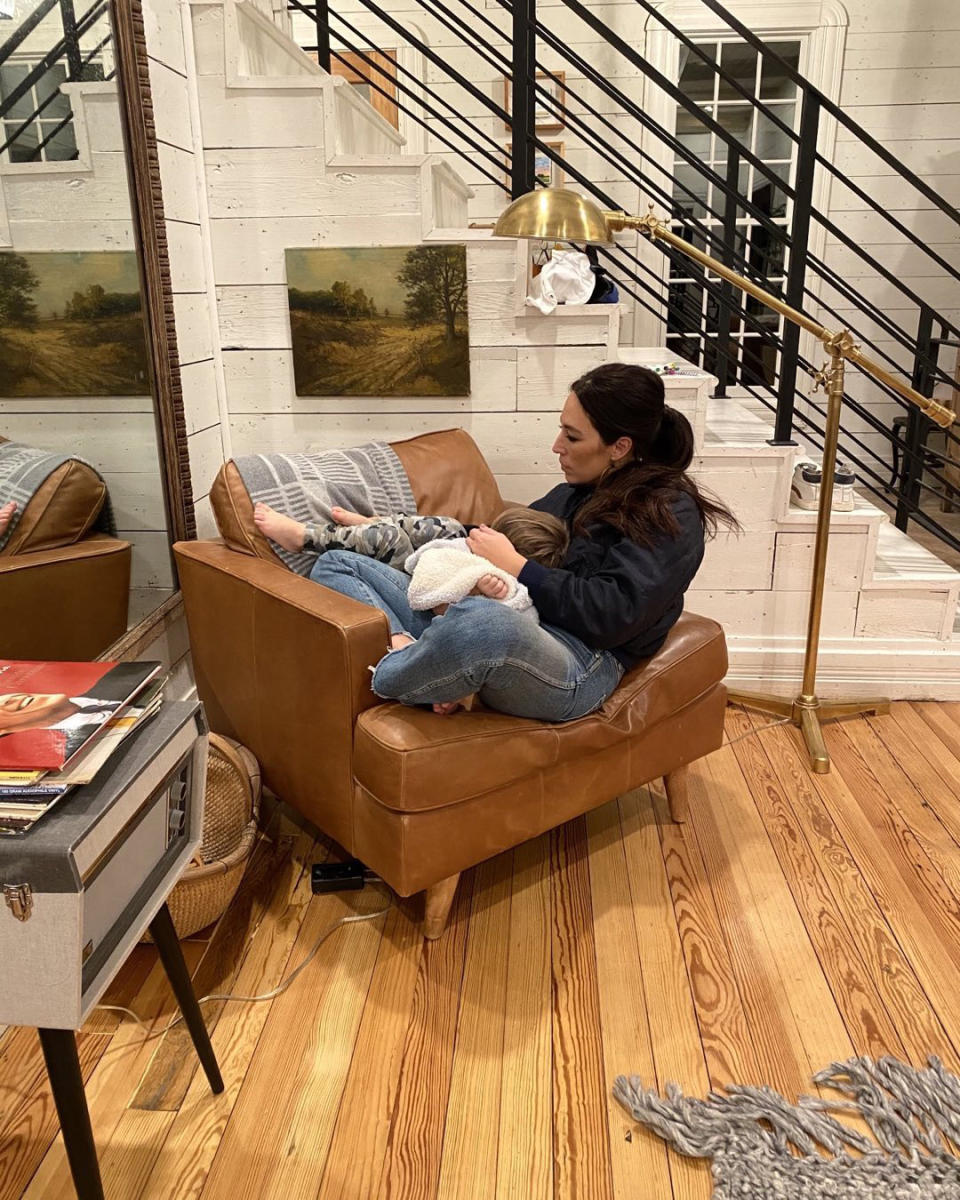 <p>The <em>Fixer Upper</em> star's husband, Chip, shared this sweet photo of his wife and their youngest child, son Crew, 2, snuggled up on a leather chair.</p> <p>"This woman does a lot of things well! But I will say the way she loves our kids is absolutely her crowning achievement," <a href="https://www.instagram.com/chipgaines/" rel="nofollow noopener" target="_blank" data-ylk="slk:Chip wrote;elm:context_link;itc:0;sec:content-canvas" class="link ">Chip wrote</a>. </p>
