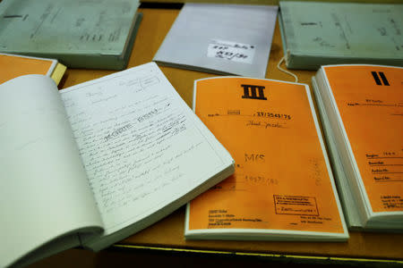 Copies of documents of the former East German Ministry for State Security (MfS), known as the Stasi, are pictured at the central archives office in Berlin, Germany, March 12, 2019. Picture taken March 12, 2019. REUTERS/Fabrizio Bensch