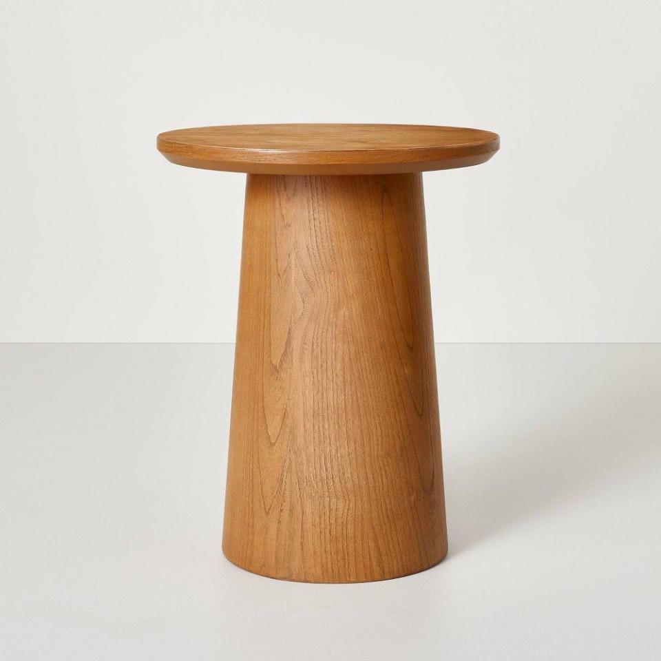 <p><a href="https://go.redirectingat.com?id=74968X1596630&url=https%3A%2F%2Fwww.target.com%2Fp%2Fwooden-round-pedestal-accent-side-table-aged-oak-hearth-38-hand-8482-with-magnolia%2F-%2FA-88503668&sref=https%3A%2F%2F" rel="nofollow noopener" target="_blank" data-ylk="slk:Shop Now;elm:context_link;itc:0;sec:content-canvas" class="link ">Shop Now</a></p><p>Wooden Round Pedestal Accent Side Table </p><p>target.com</p><p>$109.99</p>