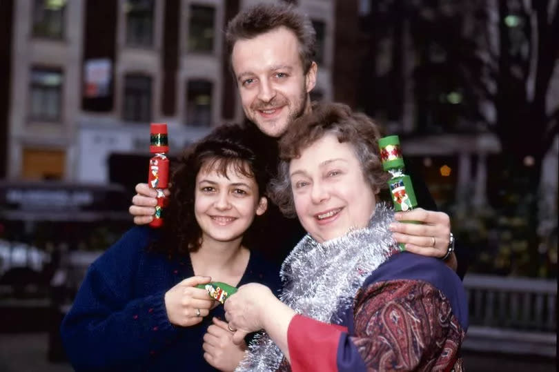 Watching cast - Paul Bown (back) alongside co-stars Emma Wray and Patsy Byrne. Photo December 1988