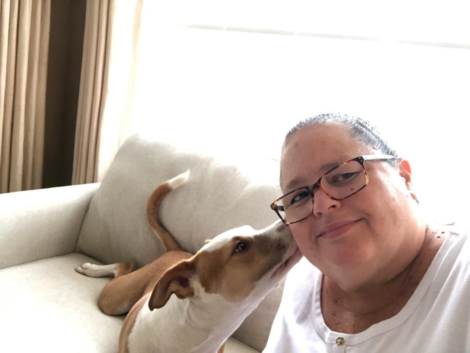 Liz Balmaseda at home with her pandemic rescue pup Lenny.