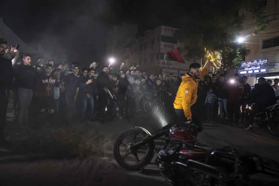 FILE - Morocco fans celebrate in Gaza City, after defeating Portugal in the World Cup quarterfinal soccer match played in Qatar, Saturday, Dec. 10, 2022. (AP Photo/Fatima Shbair, File)