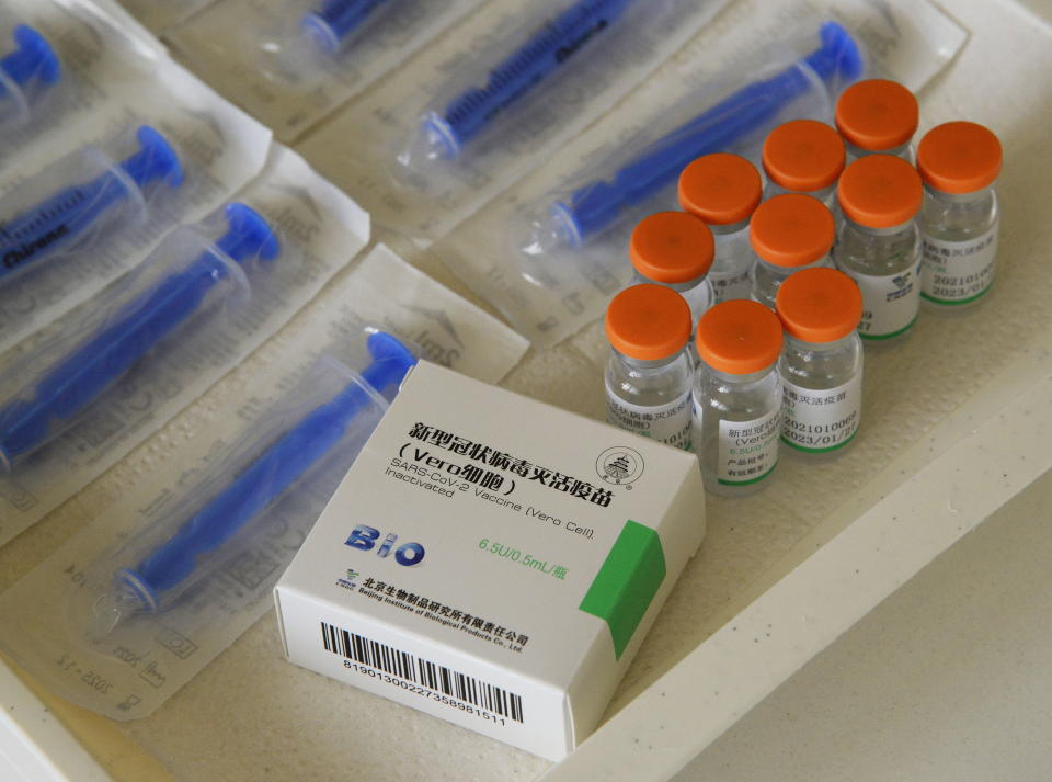 Vials of COVID-19 vaccines produced by Chinese Sinopharm in the office of general practitioner Gyorgy Teleki in Taplanszentkereszt, Hungary, Thursday, April 1, 2021, as the national vaccination campaign against the new coronavirus continues in the country. (Istvan Filep/MTI via AP)