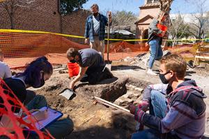 Classical archaeology professor Jim Newhard supervises student-volunteers at the excavation site on the College of Charleston campus in March.