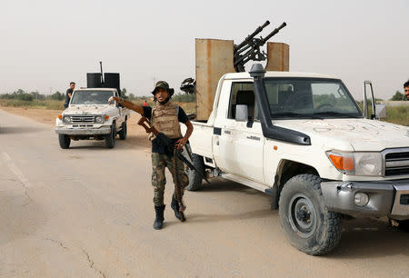 A Member of the Libyan internationally recognised government forces is seen in Al Hira area, southern west Tripoli, Libya April 23, 2019. REUTERS/Hani Amara