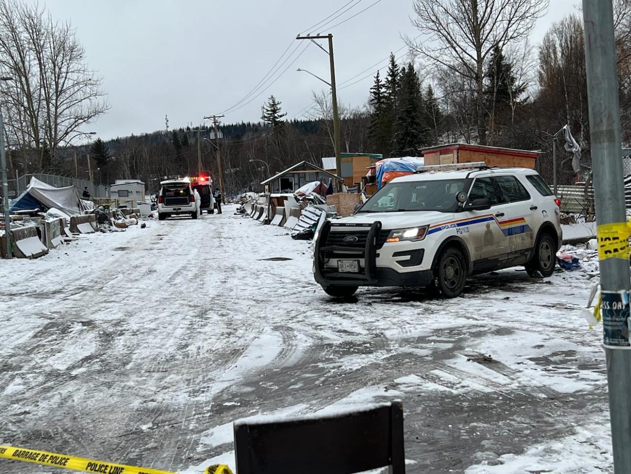 First responders are pictured at Moccasin Flats in Prince George, B.C. on Friday, Jan. 5, 2023.  (Bill Fee/CBC - image credit)