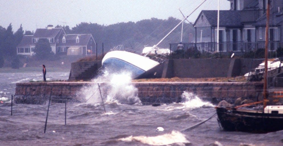 A beached sailboat on a sea wall in Monument Beach in Bourne during Hurricane Bob on Aug. 19, 1991.