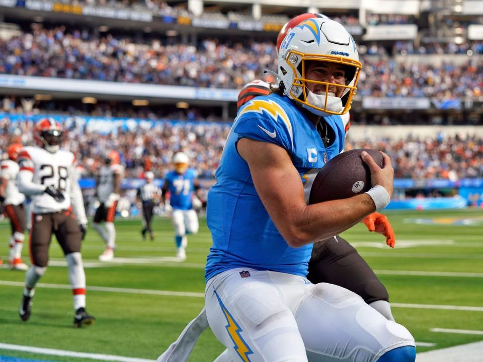 Justin Herbert scores a touchdown against the Cleveland Browns.