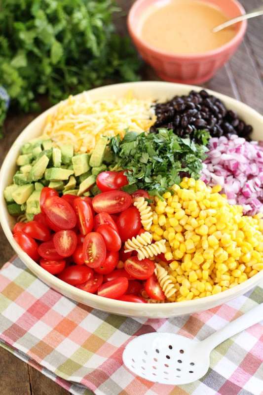 <p>Southern Bite</p><p>I love serving pasta salad as a light supper on busy nights. </p><p><strong>Cost: $11.32</strong></p><p><strong>Get the recipe: <a href="https://southernbite.com/taco-pasta-salad/" rel="nofollow noopener" target="_blank" data-ylk="slk:Taco Pasta Salad;elm:context_link;itc:0;sec:content-canvas" class="link rapid-noclick-resp">Taco Pasta Salad</a></strong></p>