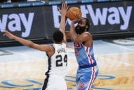 Brooklyn Nets' James Harden, right, shoots over San Antonio Spurs' Devin Vassell during the second half of an NBA basketball game Wednesday, May 12, 2021, in New York. (AP Photo/Frank Franklin II)