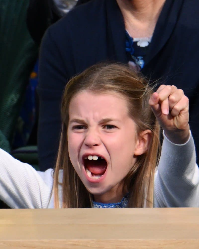 13. Princess Charlotte gets stuck in at the tennis