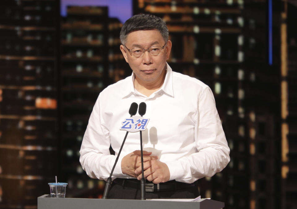 Incumbent Taipei mayor Ko Wen-je speaks in a televised debate with other Taiwan’s mayoral election candidates in Taipei, Saturday, Nov. 10, 2018. The candidates vying to become the mayor of Taiwan’s capital, Taipei, faced off in a televised debate on Saturday, two weeks before a host of local elections seen as a barometer of the ruling party’s popularity. (Pool Photo via AP)