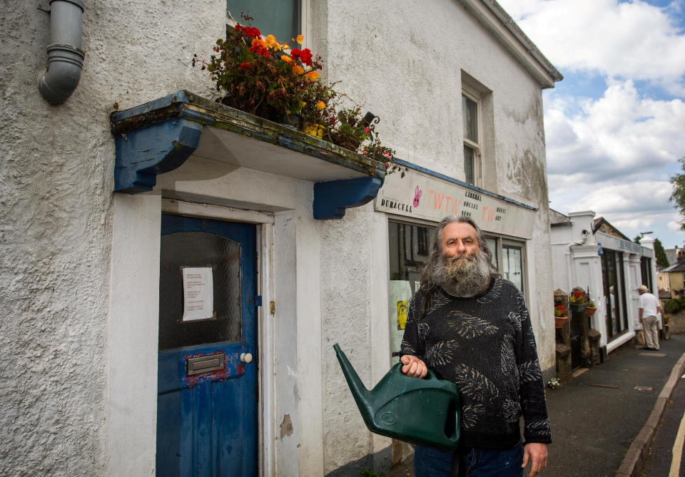 Peter Churcher, 66, claimed he was tendering to his hanging baskets in preparation for an in-bloom contest when 
