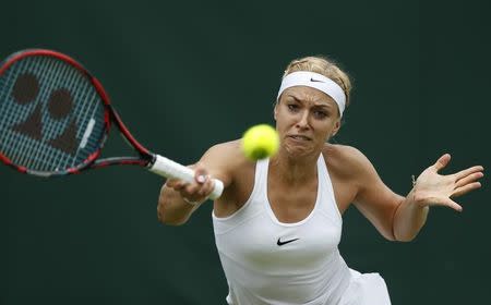 Britain Tennis - Wimbledon - All England Lawn Tennis & Croquet Club, Wimbledon, England - 30/6/16 Germany's Sabine Lisicki in action against Australia's Samantha Stosur REUTERS/Paul Childs