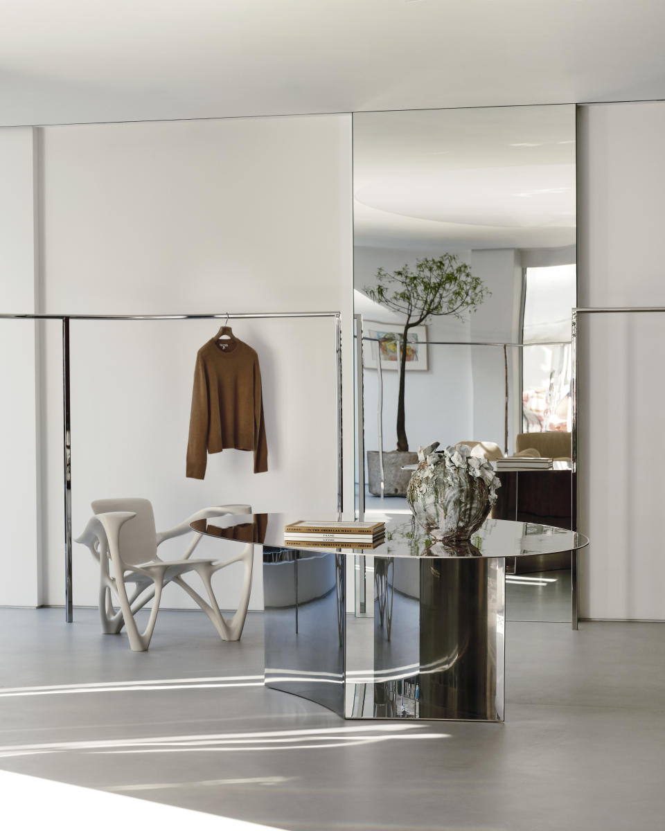 Frame cofounder Erik Torstensson designed the glass and chrome table.