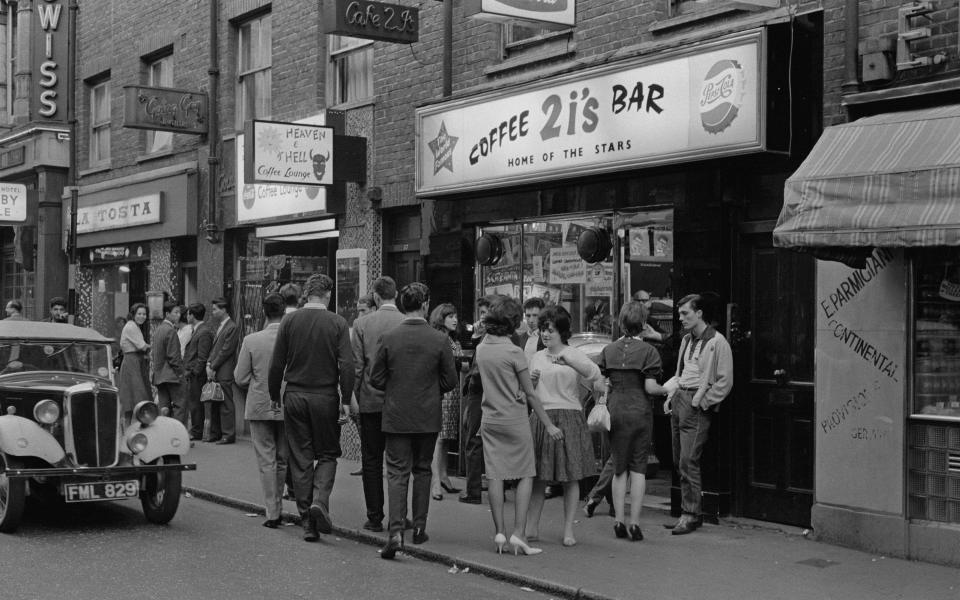 A group of young people outside the 2 I's coffee bar in Soho, London, April 1961. (Photo by Archive Photos/Getty Images)  - Getty