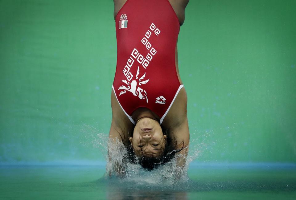 <p>Mexico’s Melany Hernandez competes during the women’s 3-meter springboard diving preliminary round in the Maria Lenk Aquatic Center at the 2016 Summer Olympics in Rio de Janeiro, Brazil, Friday, Aug. 12, 2016. (AP Photo/Wong Maye-E) </p>