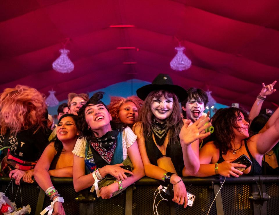 Festivalgoers dance and sing along to The Garden on Friday night.